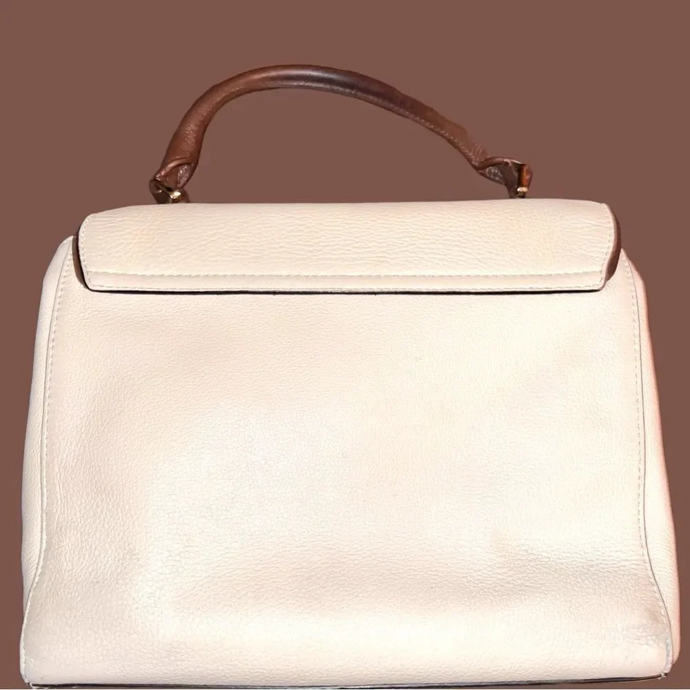 Kate Spade envelope purse. Cream with brown trim . Euc!
